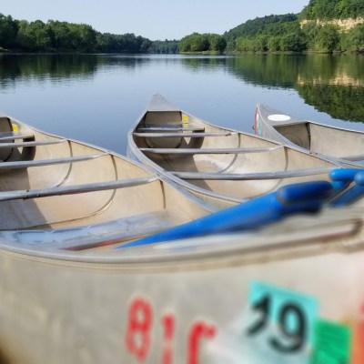 a small boat in a body of water