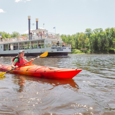 a small boat in a body of water