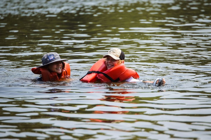 a small boat in a body of water