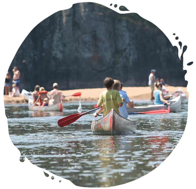 a group of people on a boat in the water