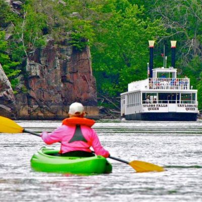 a small boat in a body of water